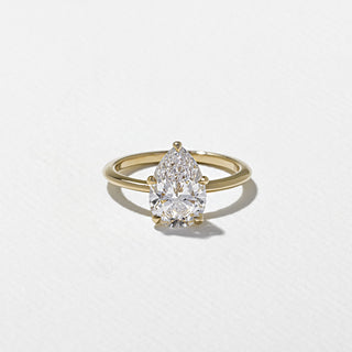 pear ring, moissanite pear ring, pear diamond ring, Affordable solitaire engagement rings online, Unique solitaire engagement rings for her, Best solitaire engagement rings for women


