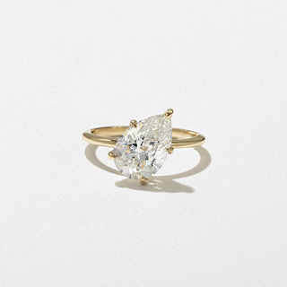 pear ring, moissanite pear ring, pear diamond ring, Best solitaire engagement rings for women, Affordable solitaire engagement rings online, Unique solitaire engagement rings for her 
