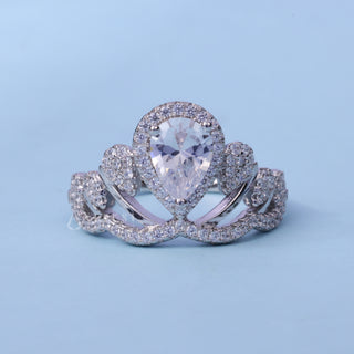 Halo Cluster Pear Cut Moissanite Engagement Ring front view with upright centre stone