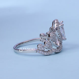 Front standing view of the Halo Cluster Pear Cut Moissanite Engagement Ring showing the prong setting