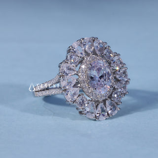 Angled view of Oval Cut Moissanite Split Shank Engagement Ring with Halo