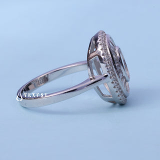 Angled view of the Oval Cut Halo Bezel Set Moissanite Engagement Ring band and setting