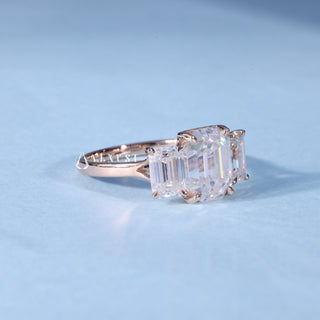 Side profile of Emerald Cut 3 Stone Moissanite Engagement Ring with Pave