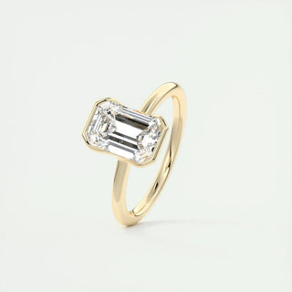 Lustrous 1.91ct emerald solitaire moissanite ring angled view showing its sparkle