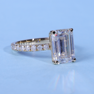 Classic 1.50ct emerald pave moissanite ring angled view showing its sparkle
