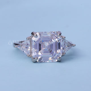 Three Stone Moissanite Asscher Cut Engagement Ring front view with upright centre stone