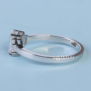 Elegant 1.0ct emerald three stone moissanite ring close up of the setting
