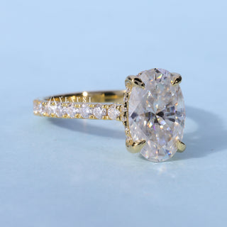 Timeless 1.50ct oval hidden halo moissanite ring angled view showing its sparkle