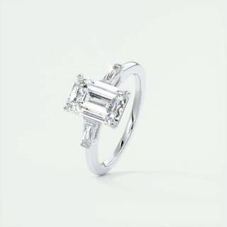 Elegant 1.91ct emerald three stone moissanite ring tilted view catching the light