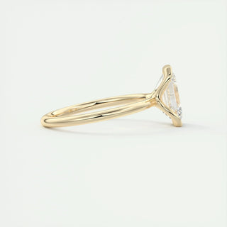 Lustrous 1.91ct emerald solitaire moissanite ring shown on a finger