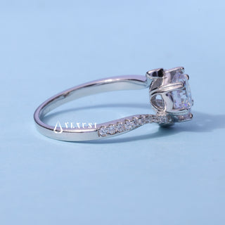 Angled view of the Tension Pave Round Cut Moissanite Engagement Ring band and setting