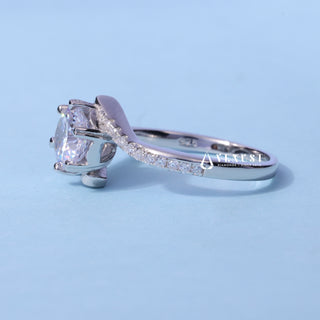 Front standing view of the Tension Pave Round Cut Moissanite Engagement Ring showing the prong setting