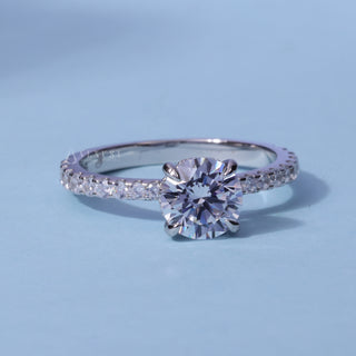 Round Cut Moissanite Pave Hidden Halo Engagement Ring front view with upright centre stone
