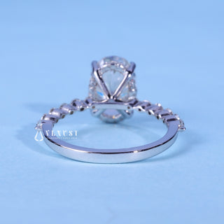 Gorgeous 2.0ct oval hidden halo moissanite ring shown on a finger