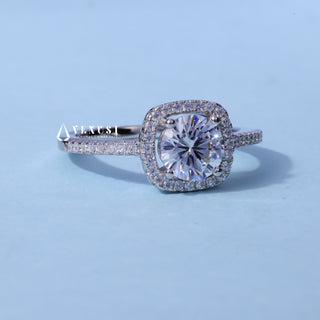 Halo Pave Round Brilliant Moissanite Ring resting on its side showing the slim band