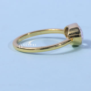Angled view of the Bezel Oval Cut East West Moissanite Engagement Ring band and setting