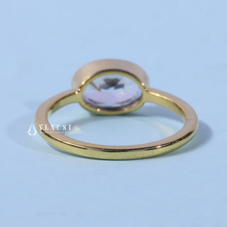Top view of the Bezel Oval Cut East West Moissanite Engagement Ring centre stone
