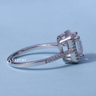 Dazzling Halo Pave Asscher Cut Moissanite Ring resting on its side showing the slim band