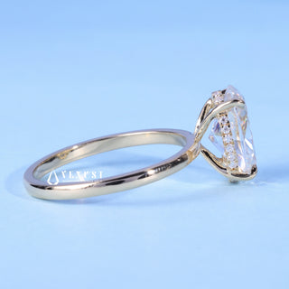 Chic 1.0ct oval hidden halo moissanite ring angled view showing its sparkle