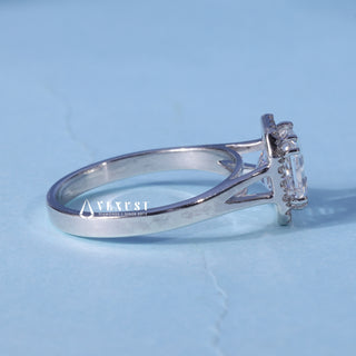 Asscher Halo Moissanite Split Shank Engagement Ring resting on its side showing the slim band