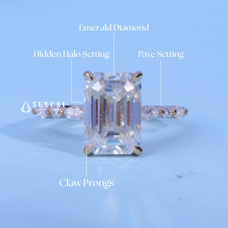 Modern 1.50ct emerald hidden halo moissanite ring shown on a finger