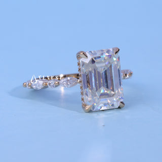 Modern 1.50ct emerald hidden halo moissanite ring angled view showing its sparkle
