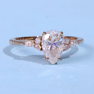 Vintage 1.0ct pear cluster moissanite ring front view