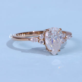 Vintage 1.0ct pear cluster moissanite ring angled view showing its sparkle