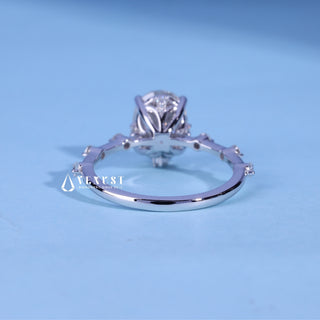 Angled view of the Oval Cut Moissanite Petite Pave Engagement Ring band and setting