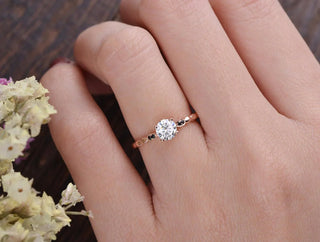 Lustrous 1.35ct round solitaire moissanite ring angled view showing its sparkle