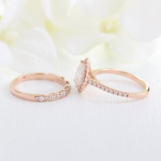 Stunning 1.50ct pear halo moissanite ring shown on a finger