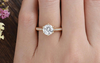 Chic 1.60ct round solitaire moissanite ring angled view showing its sparkle