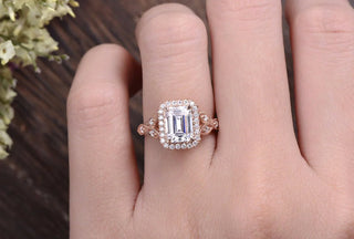 Modern 1.0ct emerald halo moissanite ring angled view showing its sparkle