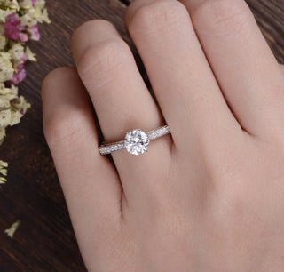 Gorgeous 1.35ct round solitaire moissanite ring angled view showing its sparkle