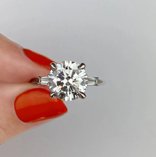 Gorgeous 2.0ct round three stone moissanite ring detail view of the band