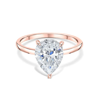 Bold 1.33ct pear hidden halo moissanite ring overhead view