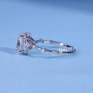 Front standing view of the Oval Cut Moissanite Petite Pave Engagement Ring showing the prong setting