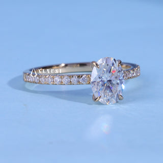 Front standing view of the Oval Cut Moissanite Pave Engagement Ring showing the prong setting