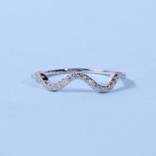 Elegant round moissanite wedding band front view