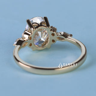 Sparkling 1.50ct oval cluster moissanite ring shown on a finger