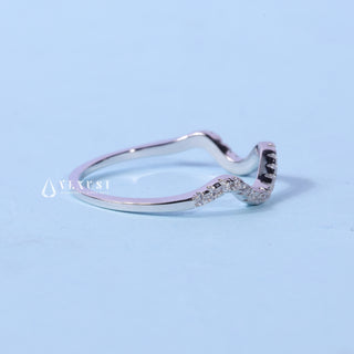 Elegant round moissanite wedding band close up of the setting