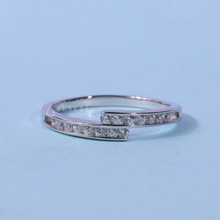 Brilliant round pave moissanite wedding band front view