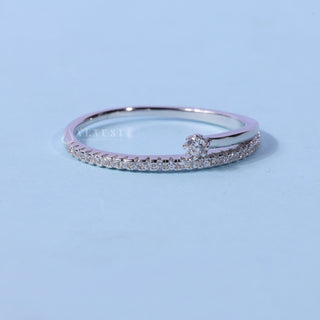 Shimmering round cluster moissanite wedding band front view