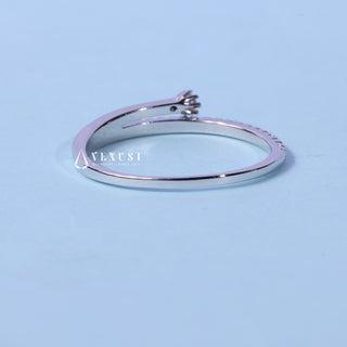 Shimmering round cluster moissanite wedding band side profile view