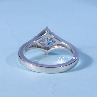 Asscher Cut Split Shank Moissanite Ring resting on its side showing the slim band