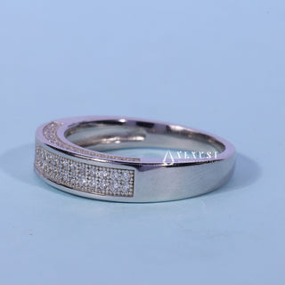 Bold round pave moissanite wedding band close up of the setting