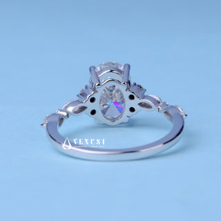 Luminous 1.50ct oval cluster moissanite ring top view
