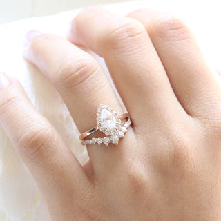 Elegant 1.0ct pear halo moissanite ring front view