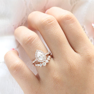 Brilliant 1.60ct pear halo moissanite ring front view