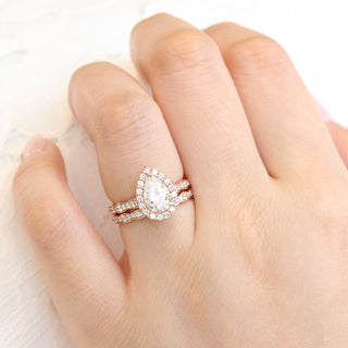 Exquisite 1.50ct pear halo moissanite ring front view